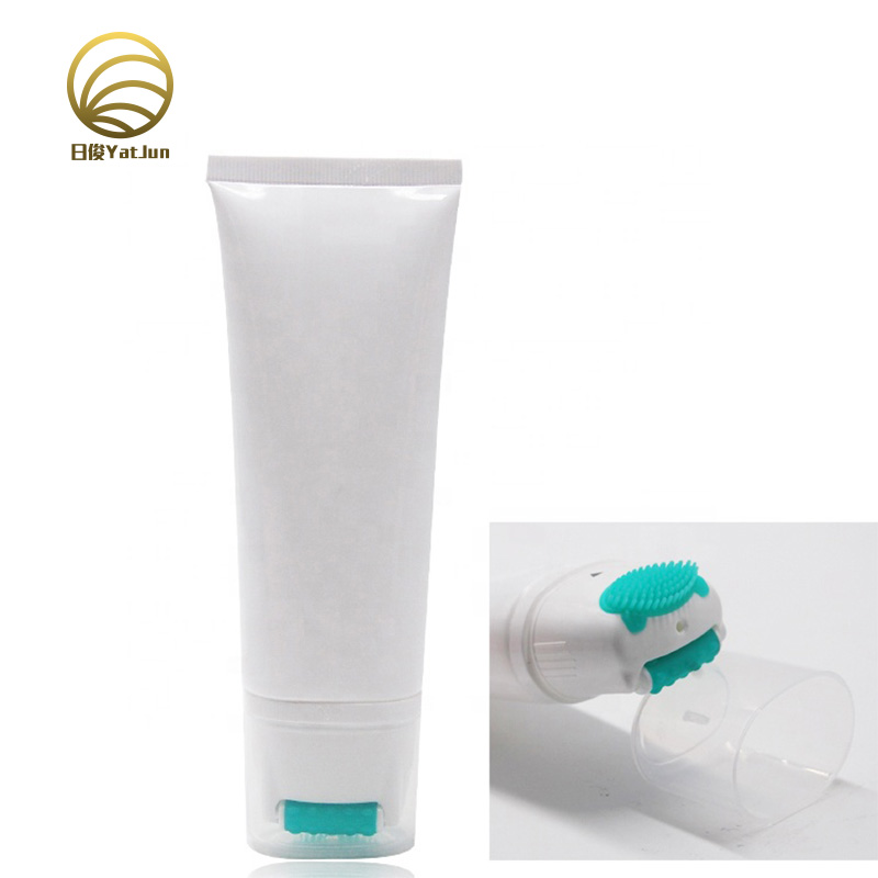 100ml cosmetic packaging empty squeeze PE oval shape tube with massage roller cap for facial wash 
